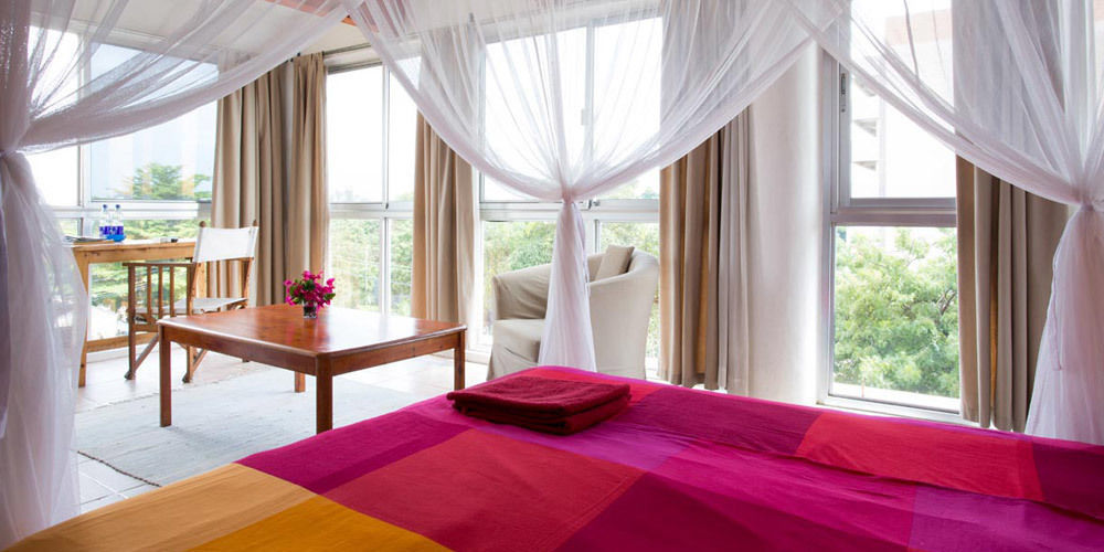 Q-Bar & Guesthouse ดาร์เอสซาลาม ภายนอก รูปภาพ